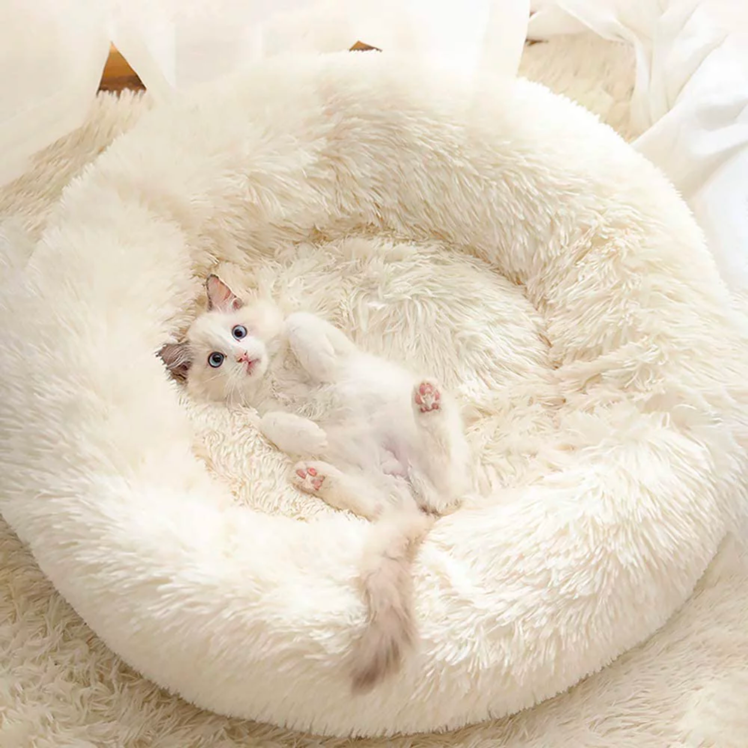 the original calming donut cat and dog bed in shag and lux fur